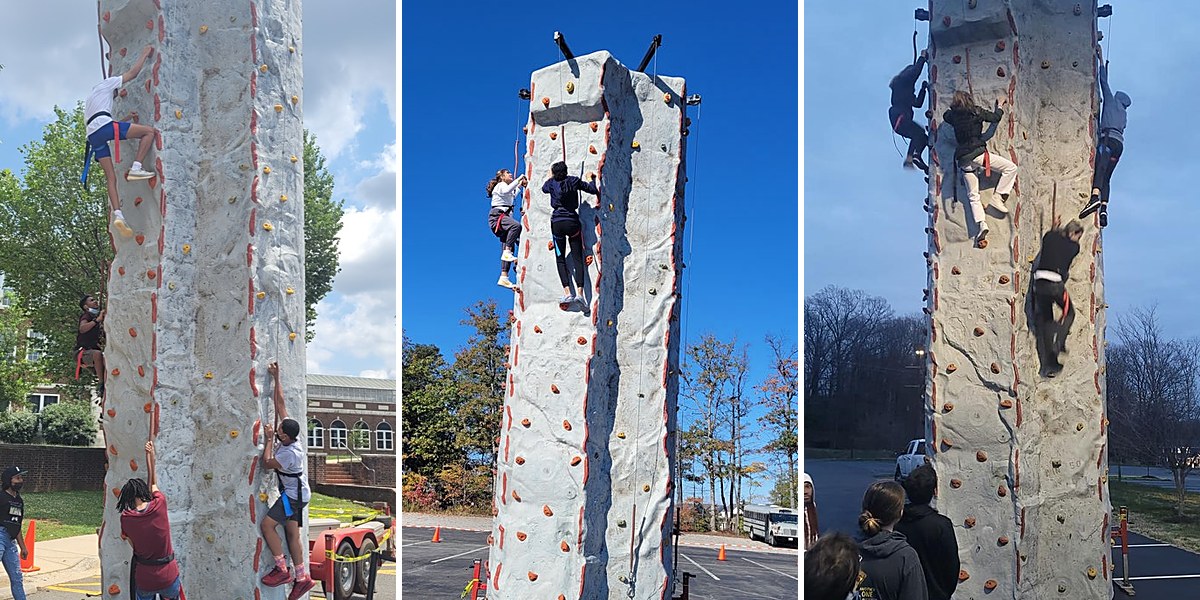 Kids climbing the Party Game Truck rock wall