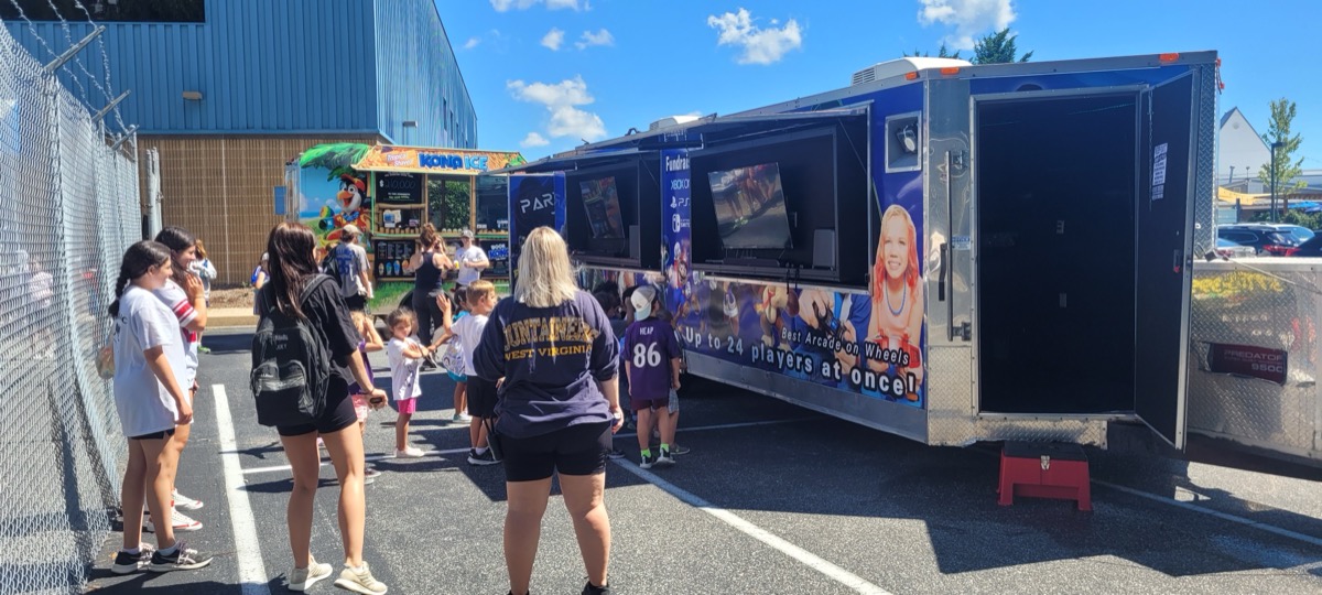 Kids at Party Game Truck summer community event